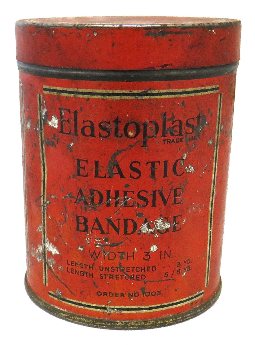 Red bandage tin labelled "Elastoplast"